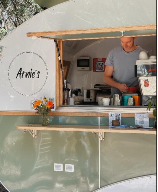 Arnie's Expresso Bar Rick from Arnies on the coffee machine